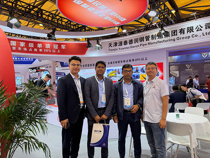 In-Depth Business Discussion at Yuantai Derun Booth W2 D12